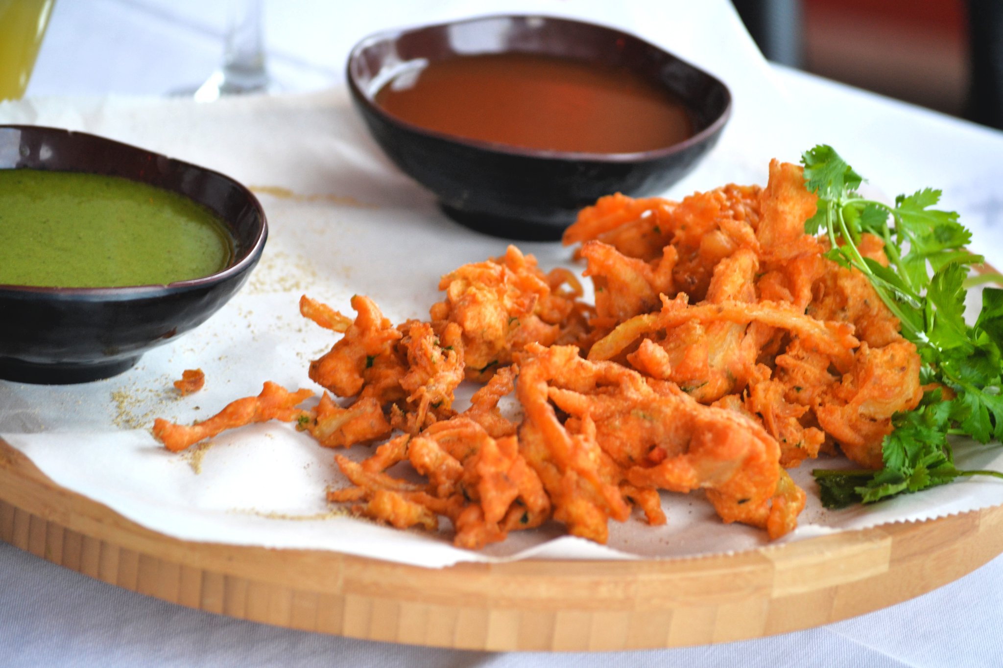 Order Onion Pakora food online from Tamarind Indian Cuisine store, Sterling on bringmethat.com