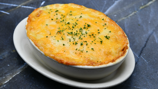 Order Smoked Gouda & Bacon Au Gratin Potatoes food online from Morton The Steakhouse store, Nashville on bringmethat.com