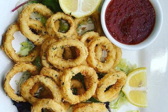 Order Fried Calamari food online from Cuatro Hermanos store, Westport on bringmethat.com