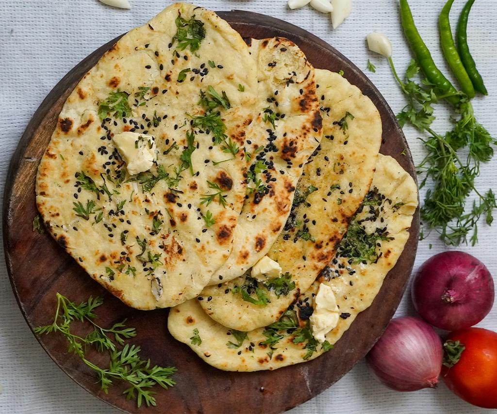 Order Spicy Onion Naan food online from Yummy Asia store, Culver City on bringmethat.com