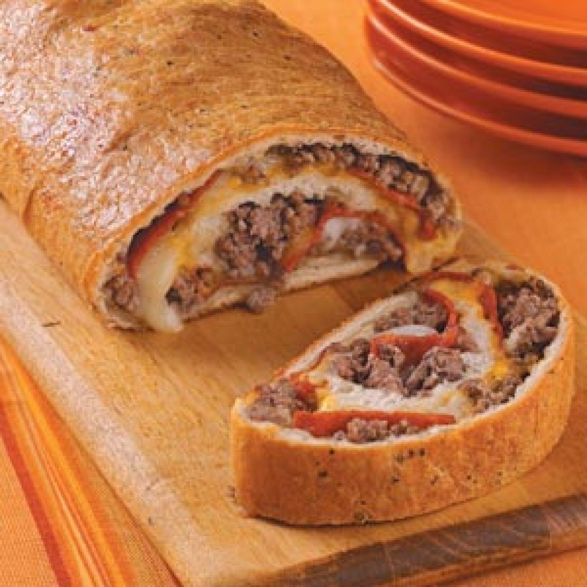 Order Sausage Peppers Onion Stromboli food online from Buonos Pizza store, Gilbert on bringmethat.com