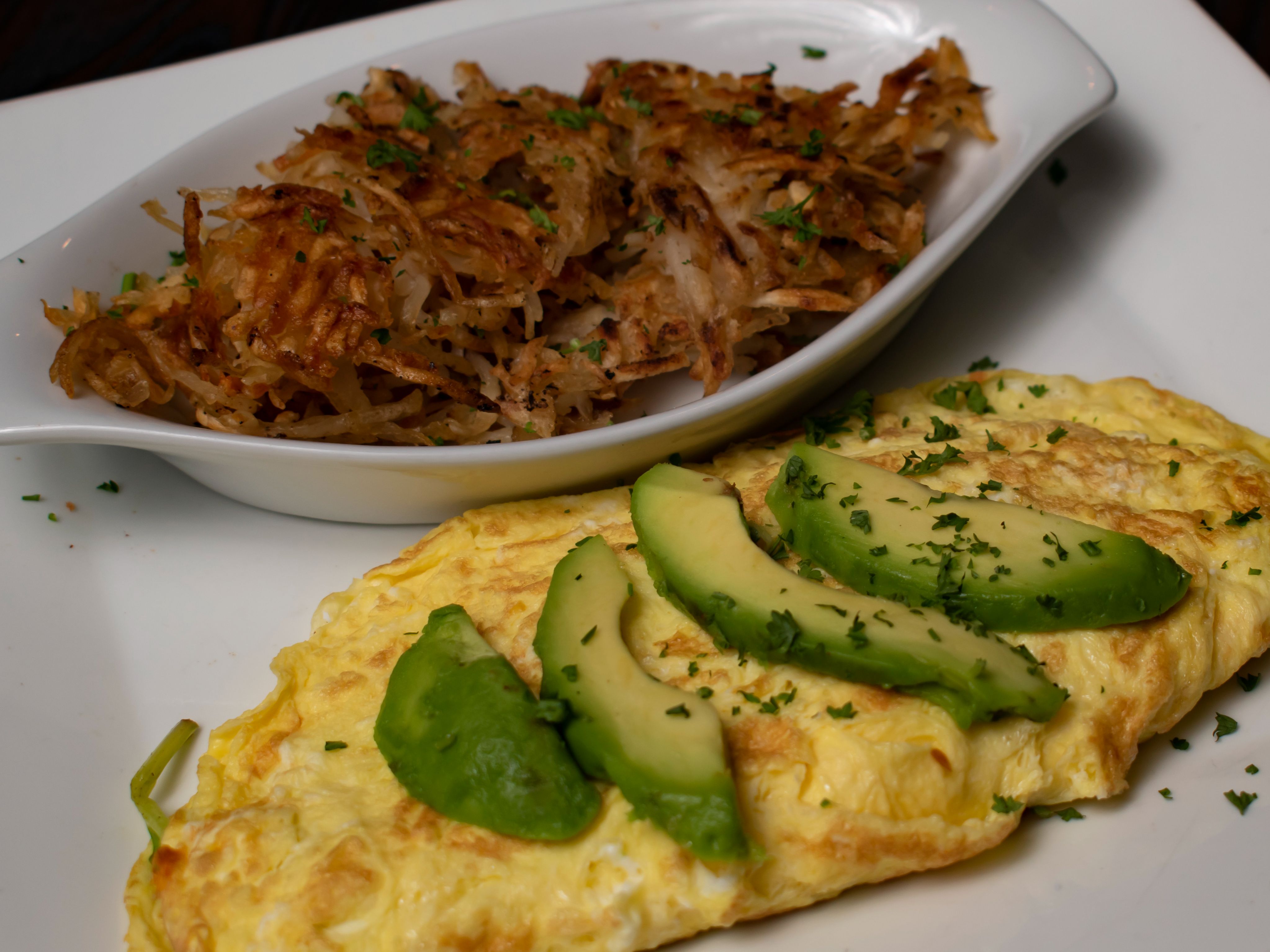 Order Bacon, Cheddar & Avocado Omelette food online from La Papillon store, Lancaster on bringmethat.com