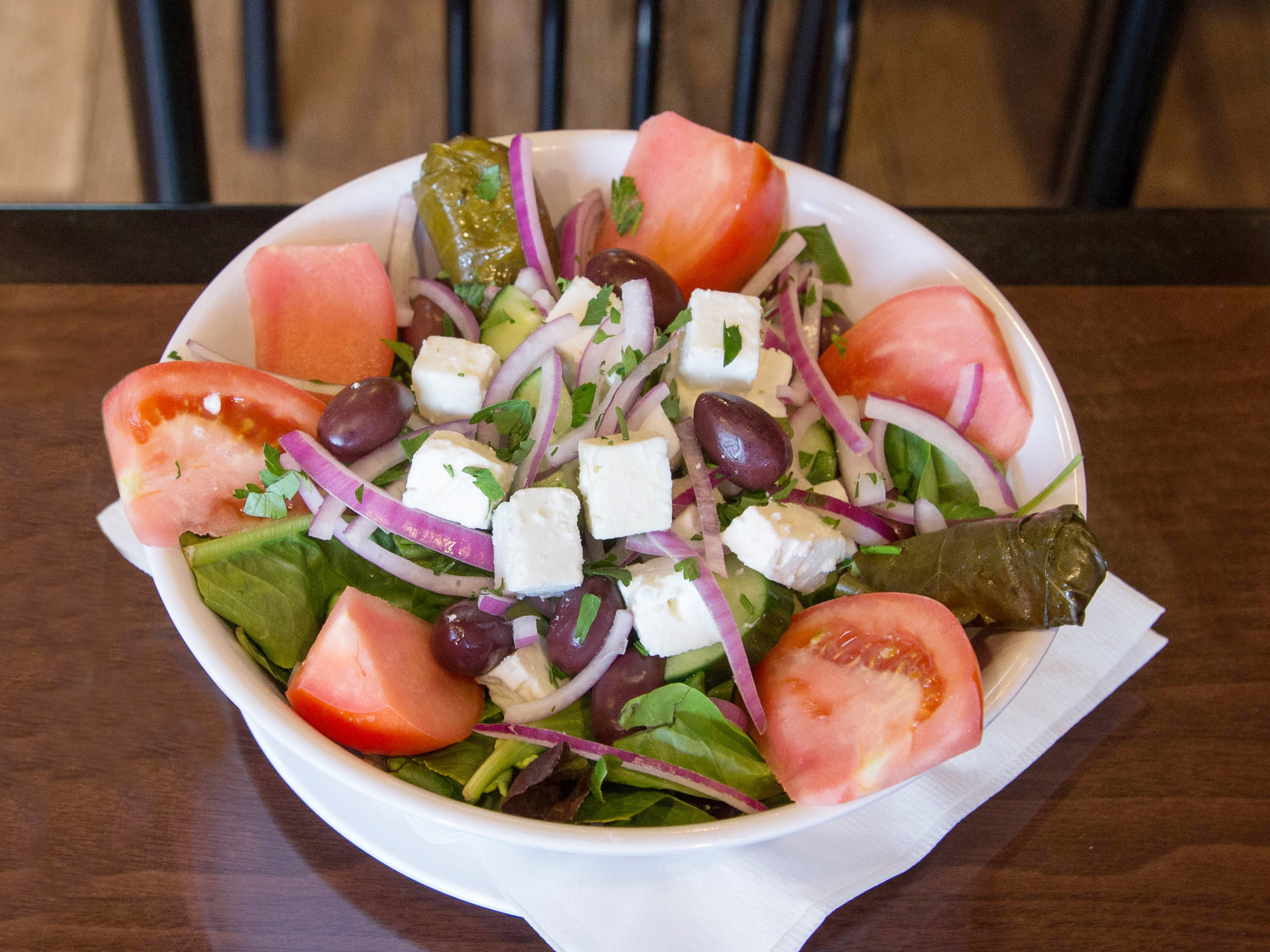 Order Greek Salad food online from Fresko Souvlaki and Gyro House store, Franklin Square on bringmethat.com