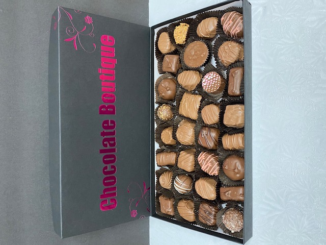 Order 1 lb Box of Assorted Milk Chocolates  food online from Chocolate Boutique store, Pittsburgh on bringmethat.com
