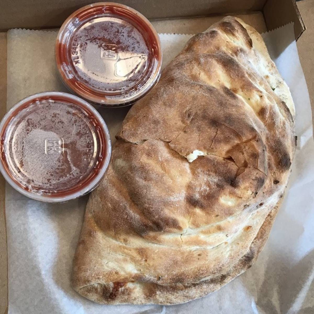 Order Cheese Calzone - Calzone food online from Trumbull Pizza Co store, Trumbull on bringmethat.com
