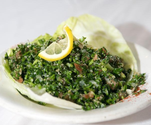 Order Tabouli Salad food online from Tripoli Restaurant store, Brooklyn on bringmethat.com