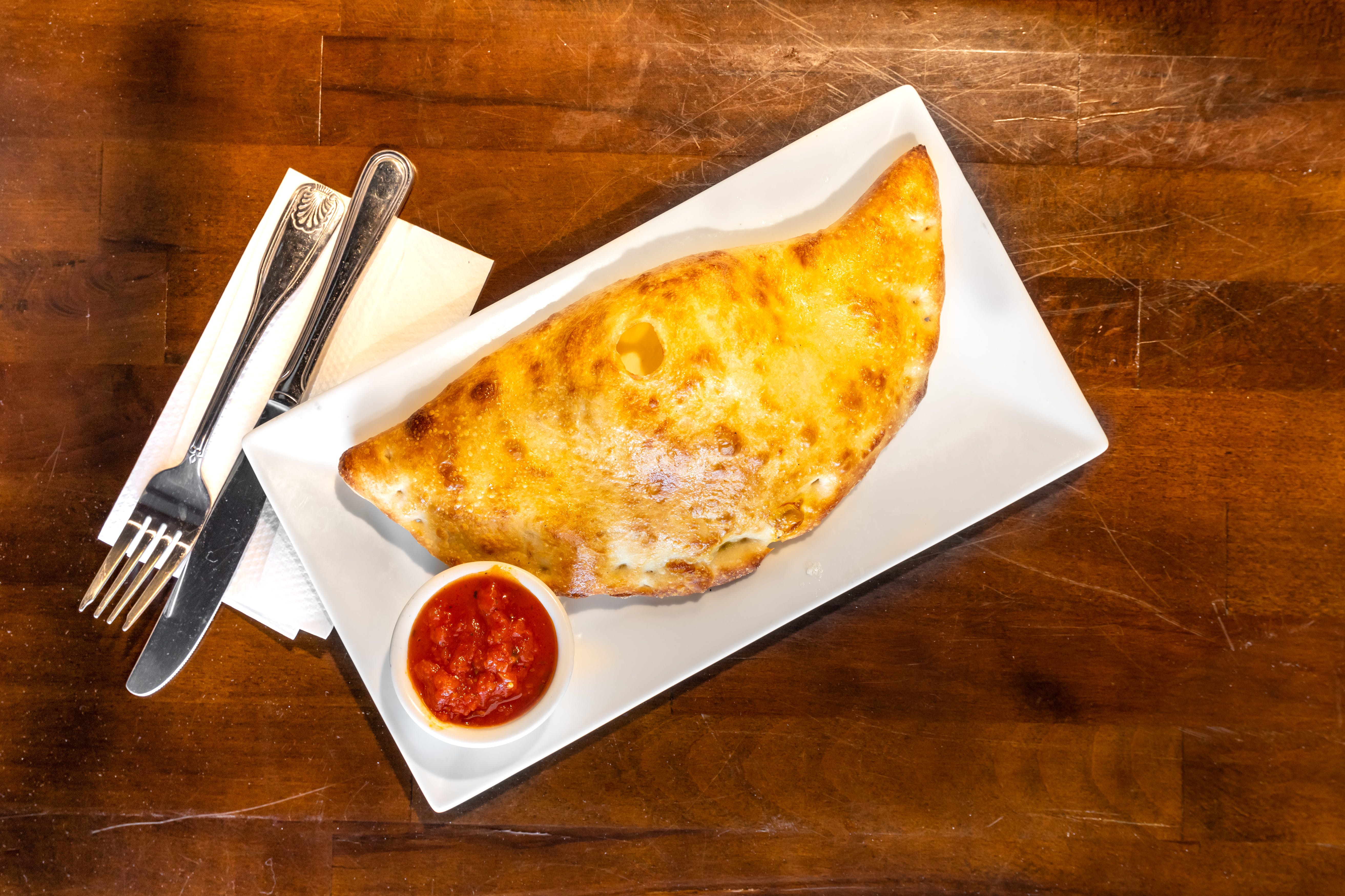 Order Ricotta Cheese & Mozzarela Calzone - Small (1-2 People) food online from Pop-Pop Ny Pizza store, Jackson Township on bringmethat.com