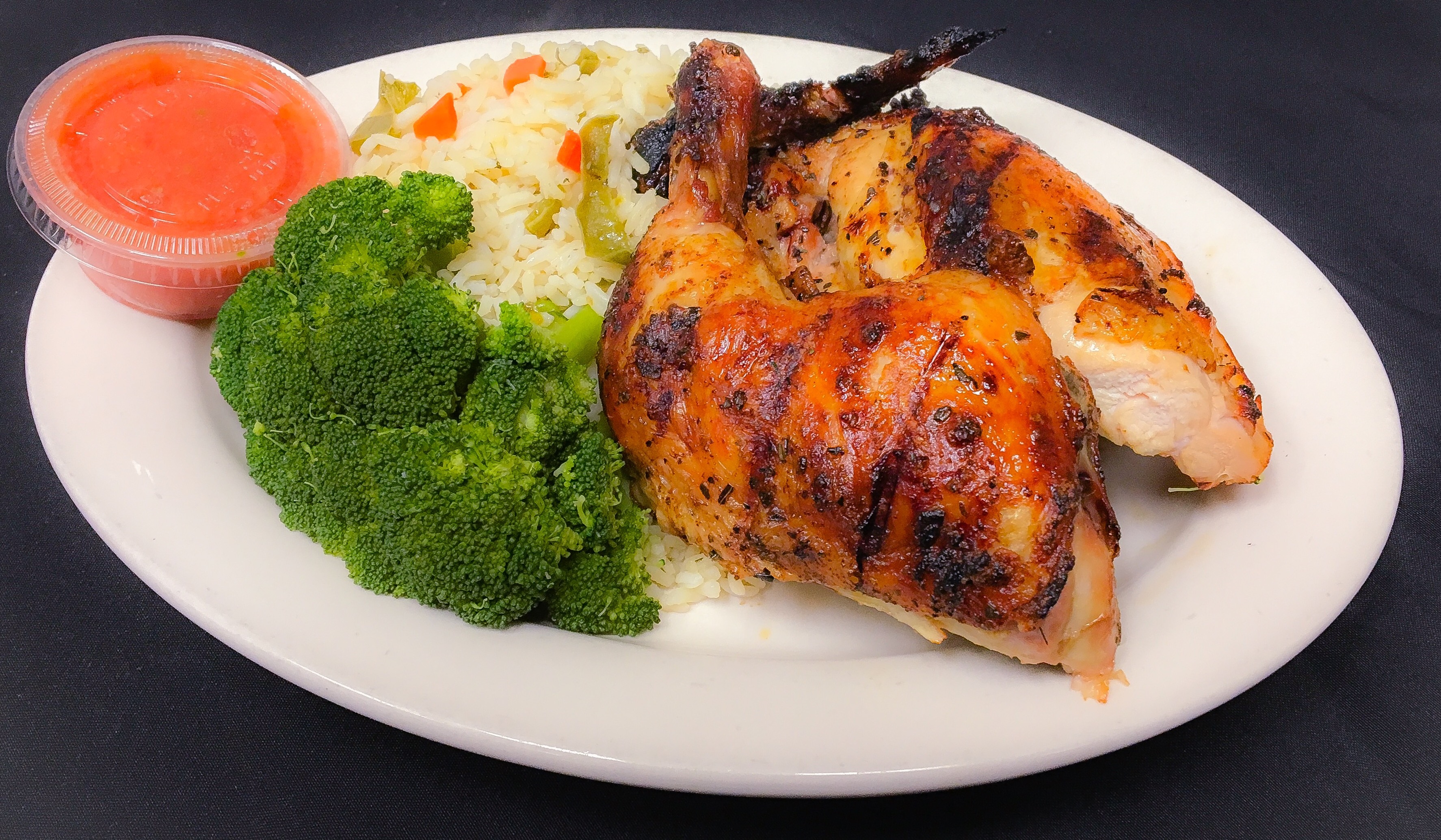 Order 1/2 Broiled Chicken food online from Stanley's Grill store, Chicago on bringmethat.com
