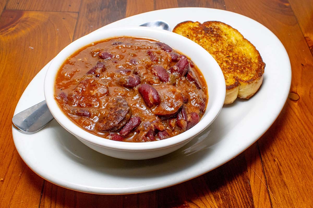 Order Red Beans & Rice - Bowl food online from Boudreaux's Cajun Kitchen store, Houston on bringmethat.com