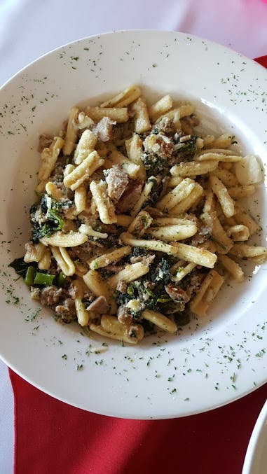 Order Cavatelli with Sausage & Broccoli Rabe - Pasta food online from Italy's Restaurant & Pizzeria store, Phillipsburg on bringmethat.com