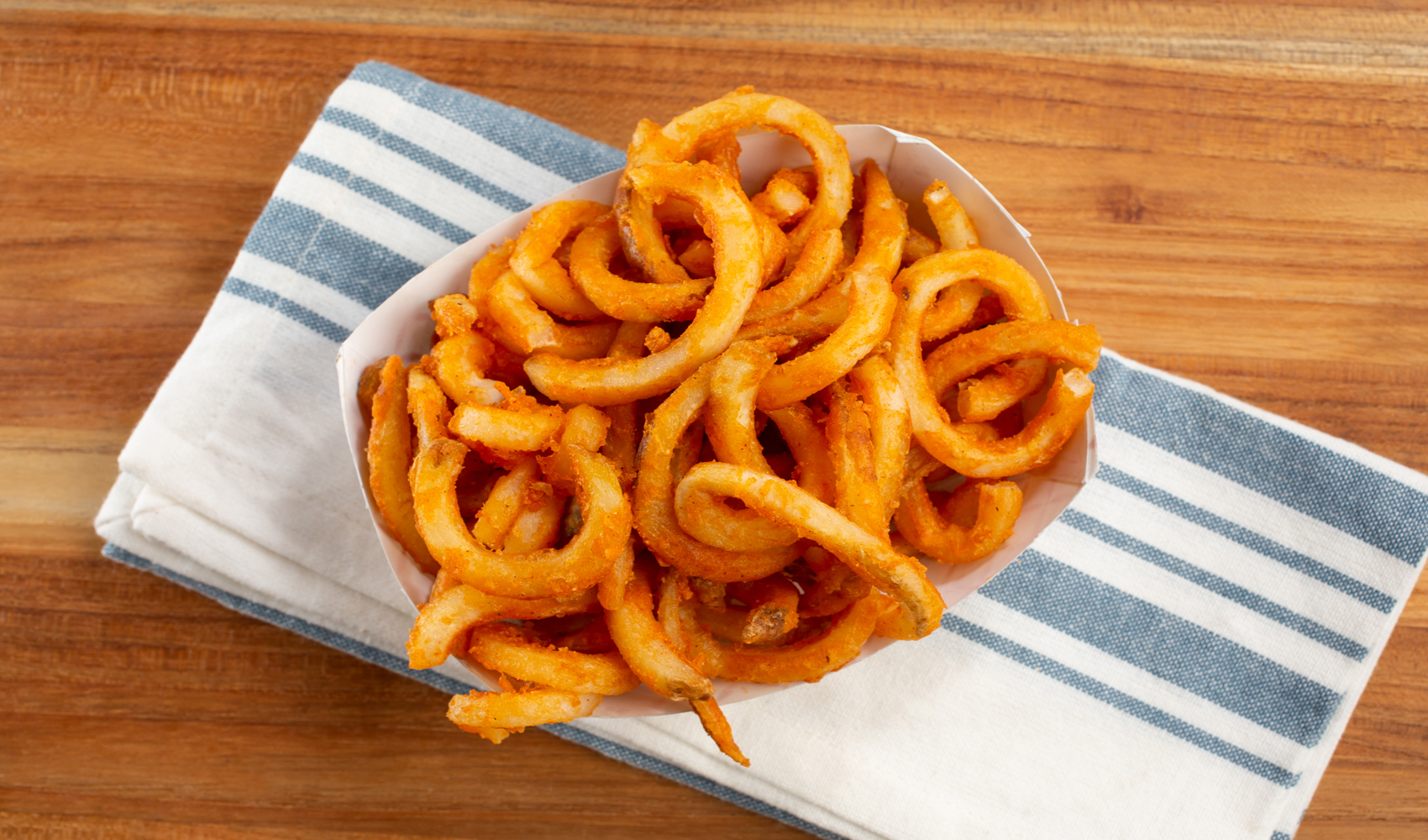 Order Curly French Fries food online from Pacific Restaurant store, Huntington Park on bringmethat.com