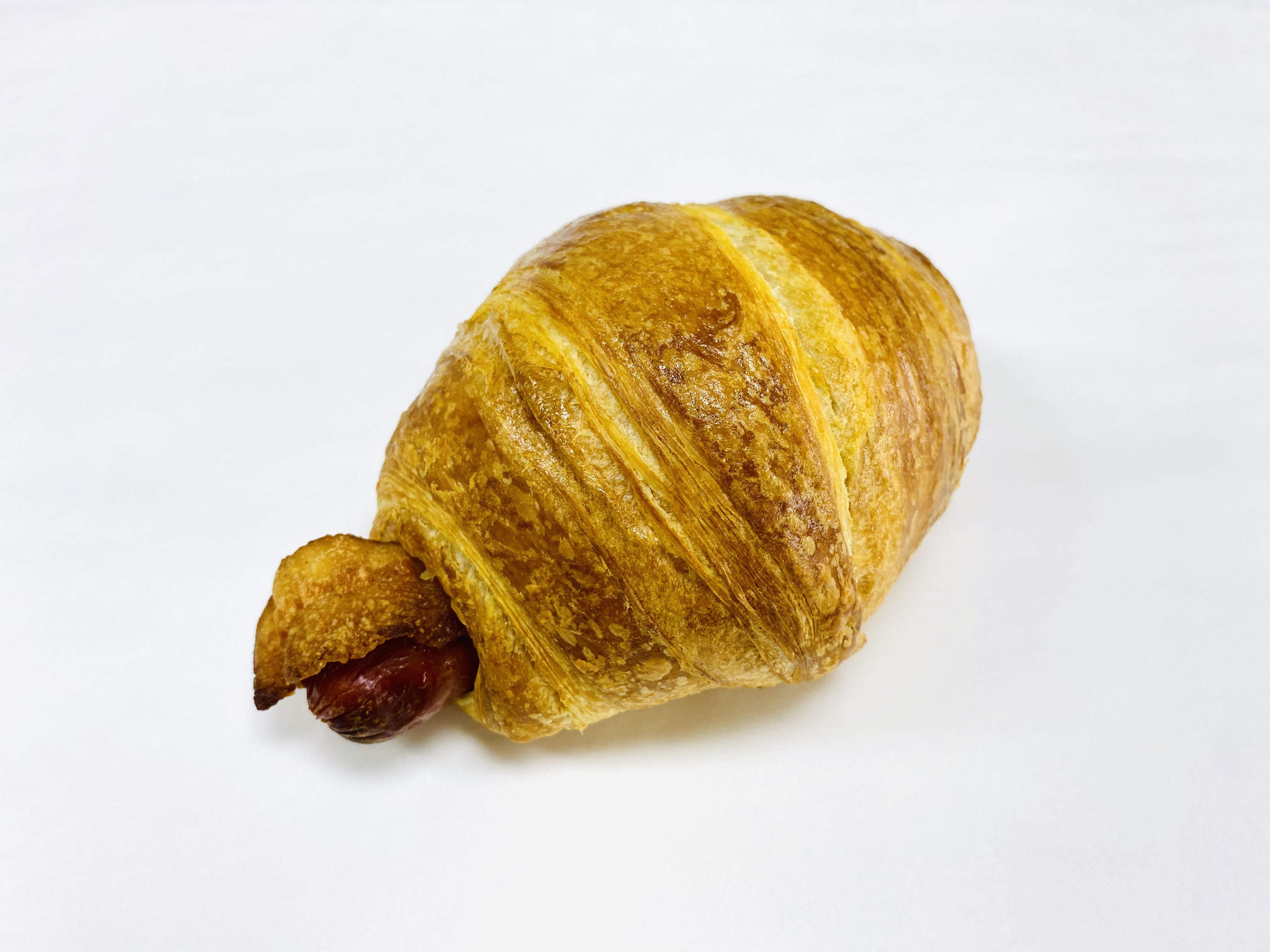 Order Jumbo Sausage and Bacon Croissant Roll food online from Jin Donuts store, Farmers Branch on bringmethat.com