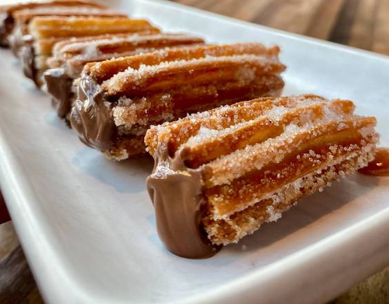 Order Churros con Nutella food online from Teleferic Barcelona store, Walnut Creek on bringmethat.com