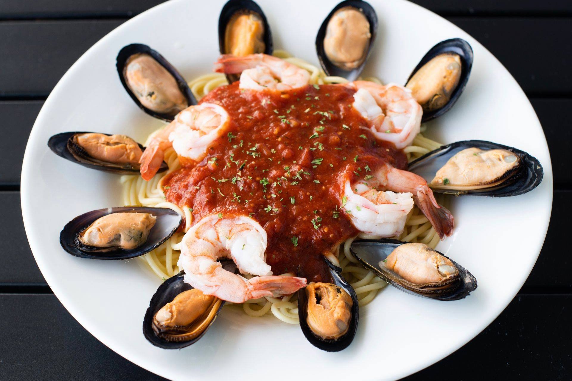 Order Seafood Spaghetti Marinara food online from Hook & Reel Cajun Seafood store, West Valley City on bringmethat.com