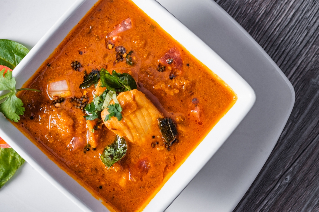 Order Coastal Fish Curry (Chef's Special) food online from Lime & Lemon Indian Grill store, Raleigh on bringmethat.com