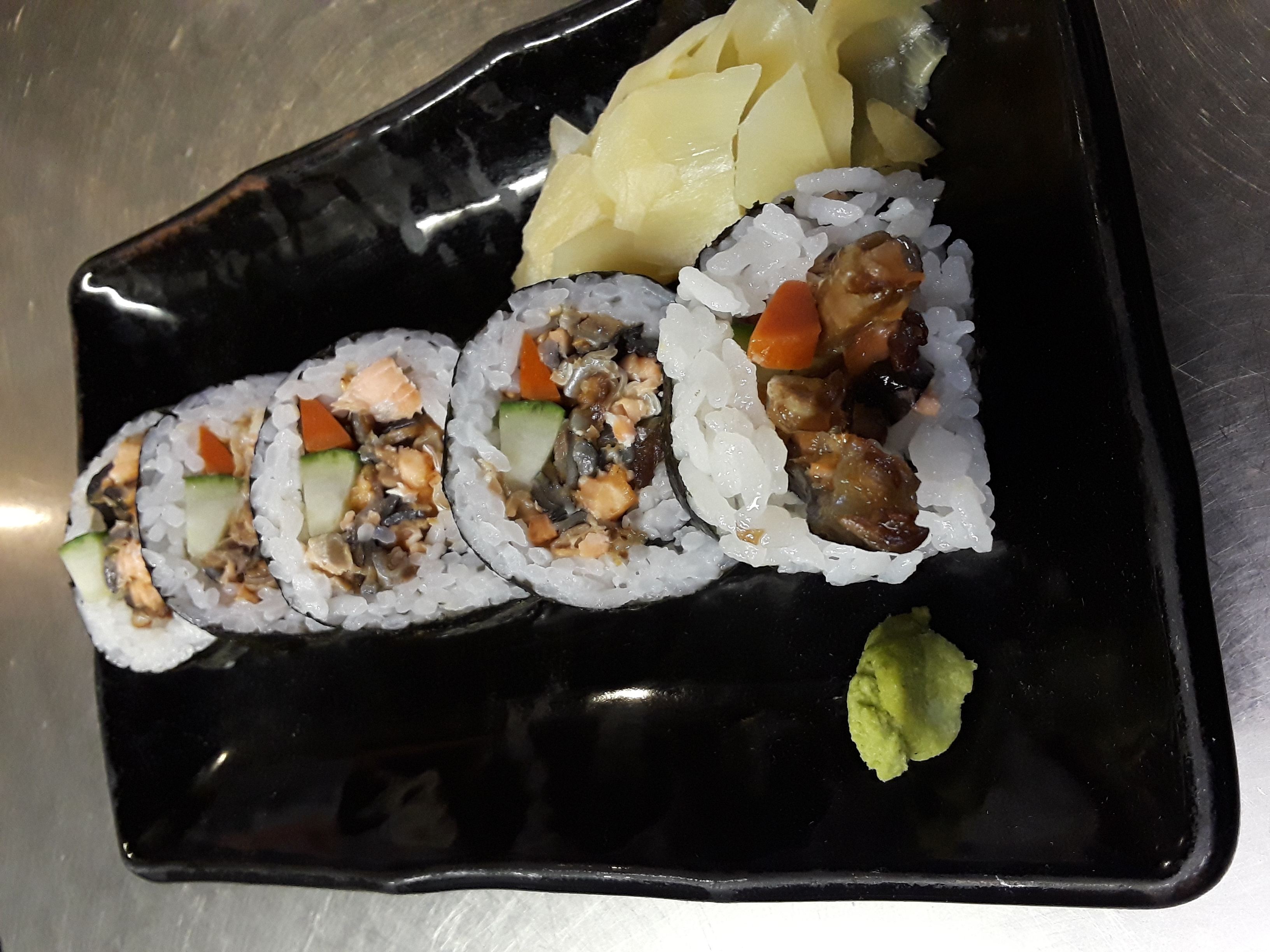 Order Salmon Skin Roll food online from Sushi Dragon store, Sun Valley on bringmethat.com