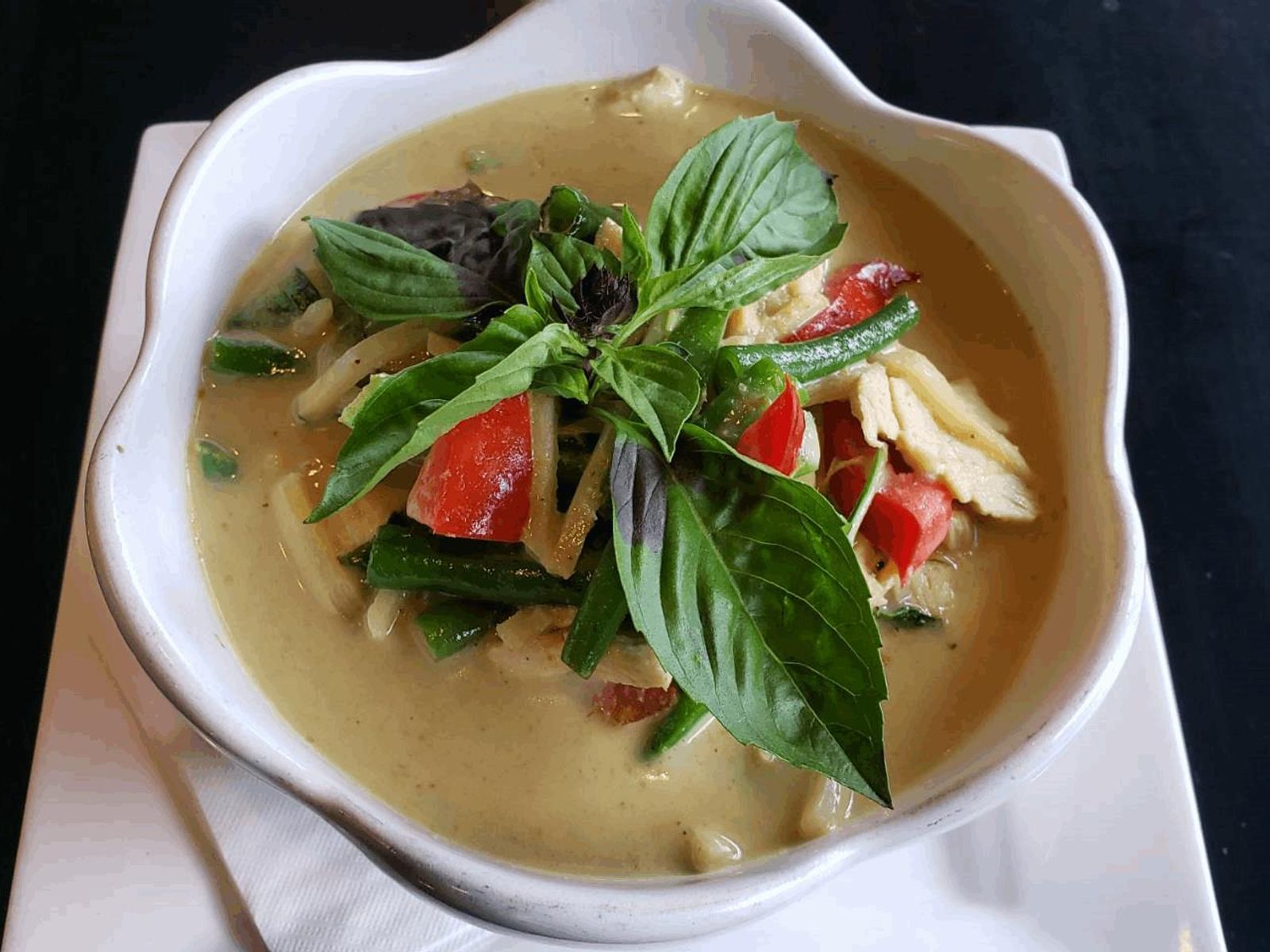 Order Green Curry food online from Thai Thani Kitchen store, Seattle on bringmethat.com