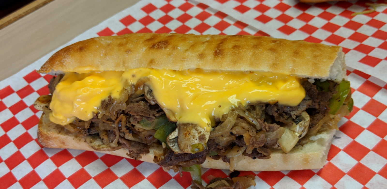Order Wiz Steak food online from Marco Polo Cheesesteaks store, New Braunfels on bringmethat.com