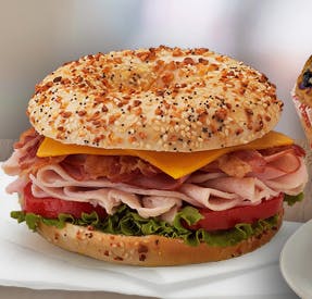 Order Turkey Club (500-660 cal) food online from My Favorite Muffin store, Montrose on bringmethat.com