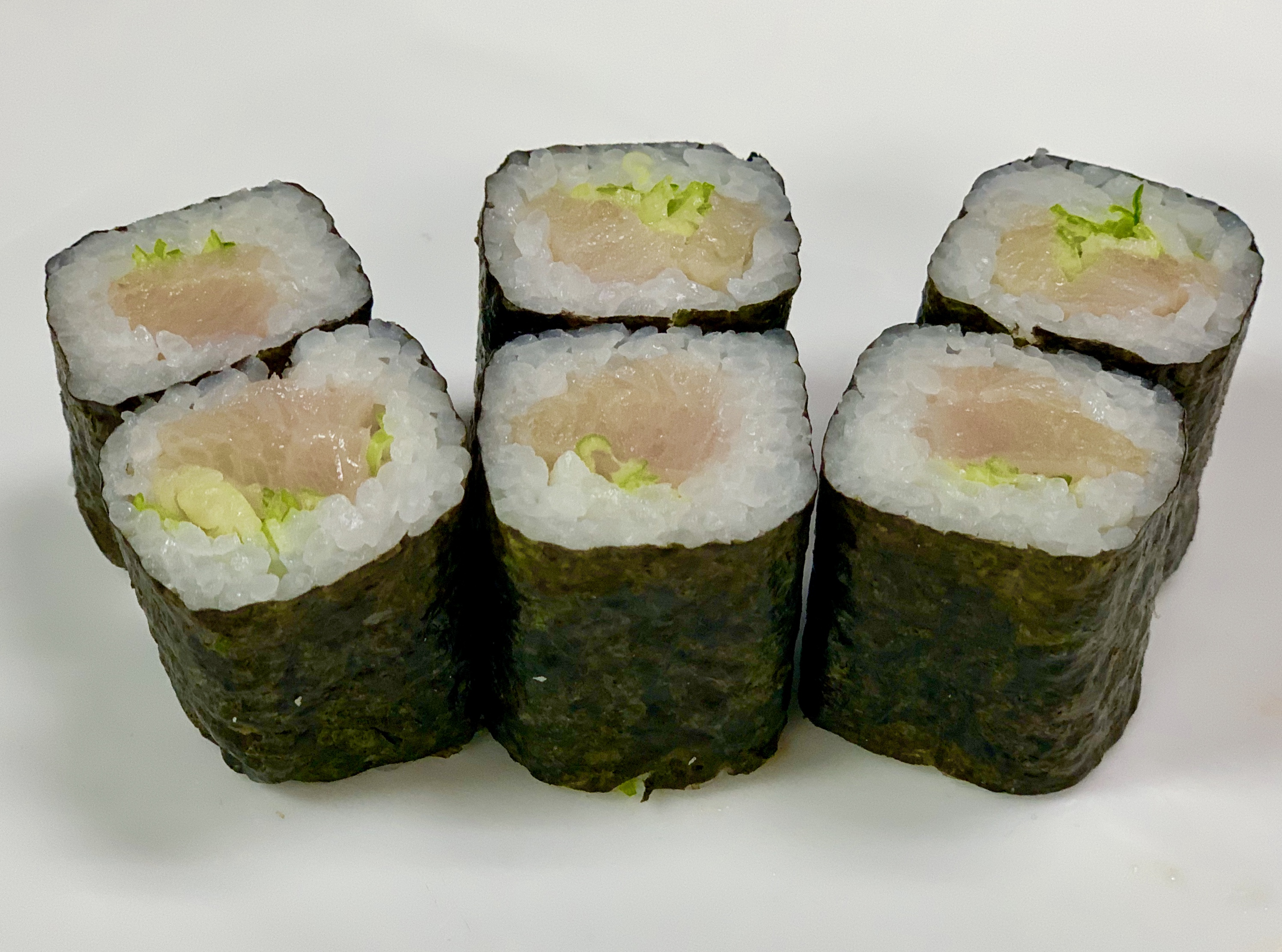 Order Yellowtail Roll food online from Red Bowl Asian Bistro store, Cary on bringmethat.com