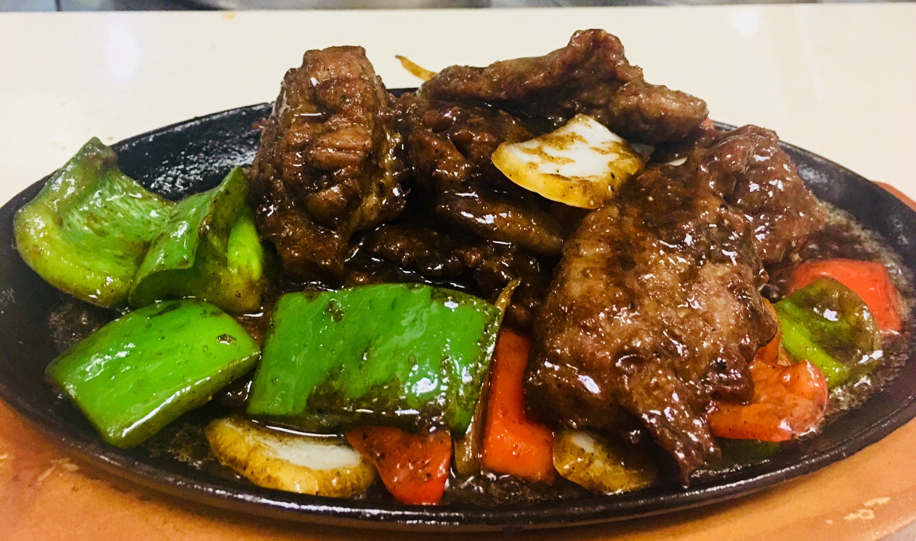 Order C37. Sliced Beef on Sizzling Plate food online from Rolling Cooking store, Springfield on bringmethat.com