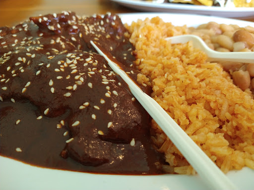 Order Mole de pollo  food online from El Guapito Mexican Food store, Bell Gardens on bringmethat.com