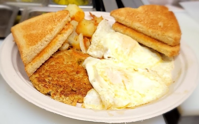 Order Two Eggs With Salmon Cake food online from Steak In A Sack store, Fort Washington on bringmethat.com