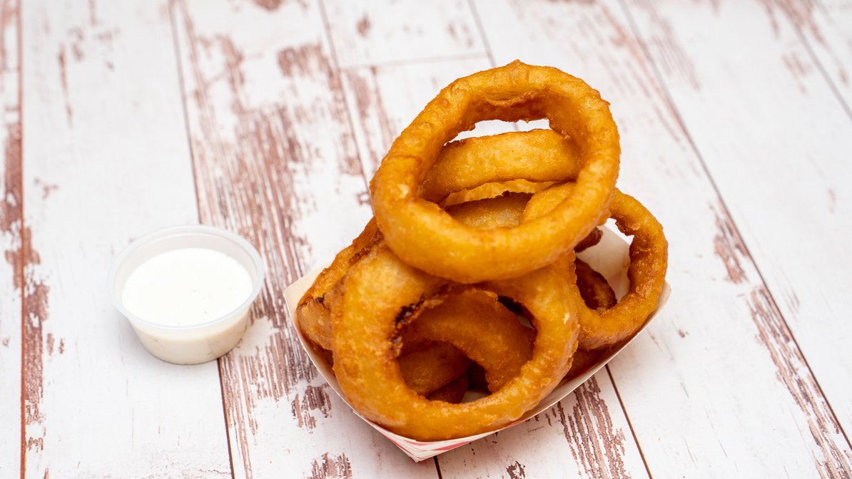 Order Deep Fried Onion Rings food online from Cheesesteak Grille store, Roseville on bringmethat.com