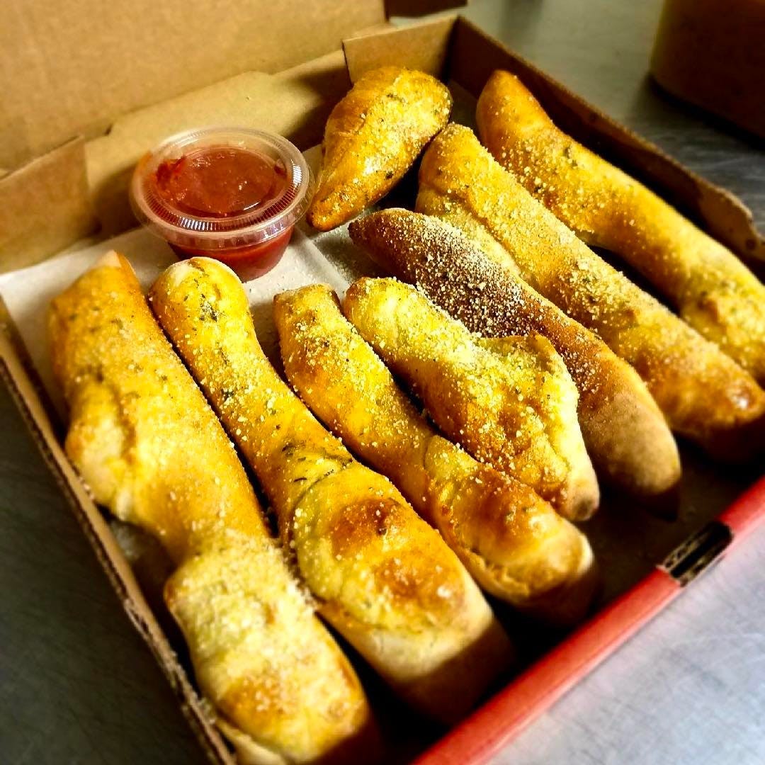 Order Breadsticks - 8 Pieces food online from Large Plain store, Pittsburgh on bringmethat.com