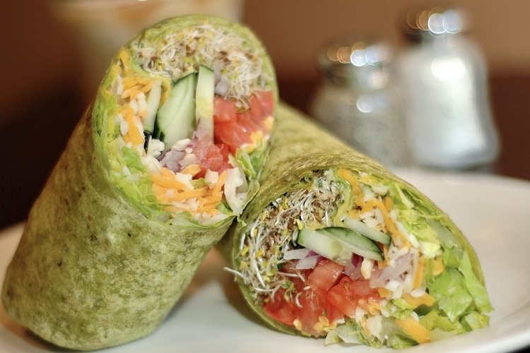 Order Veggie Wrap food online from Memo Bagel Cafe store, El Cajon on bringmethat.com