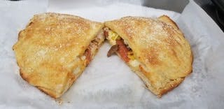 Order Calzone - 10'' food online from Monty's Pizza store, Chesapeake on bringmethat.com