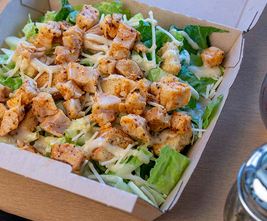 Order Spicy Chicken Caesar Salad food online from Curry Pizza House store, Dublin on bringmethat.com