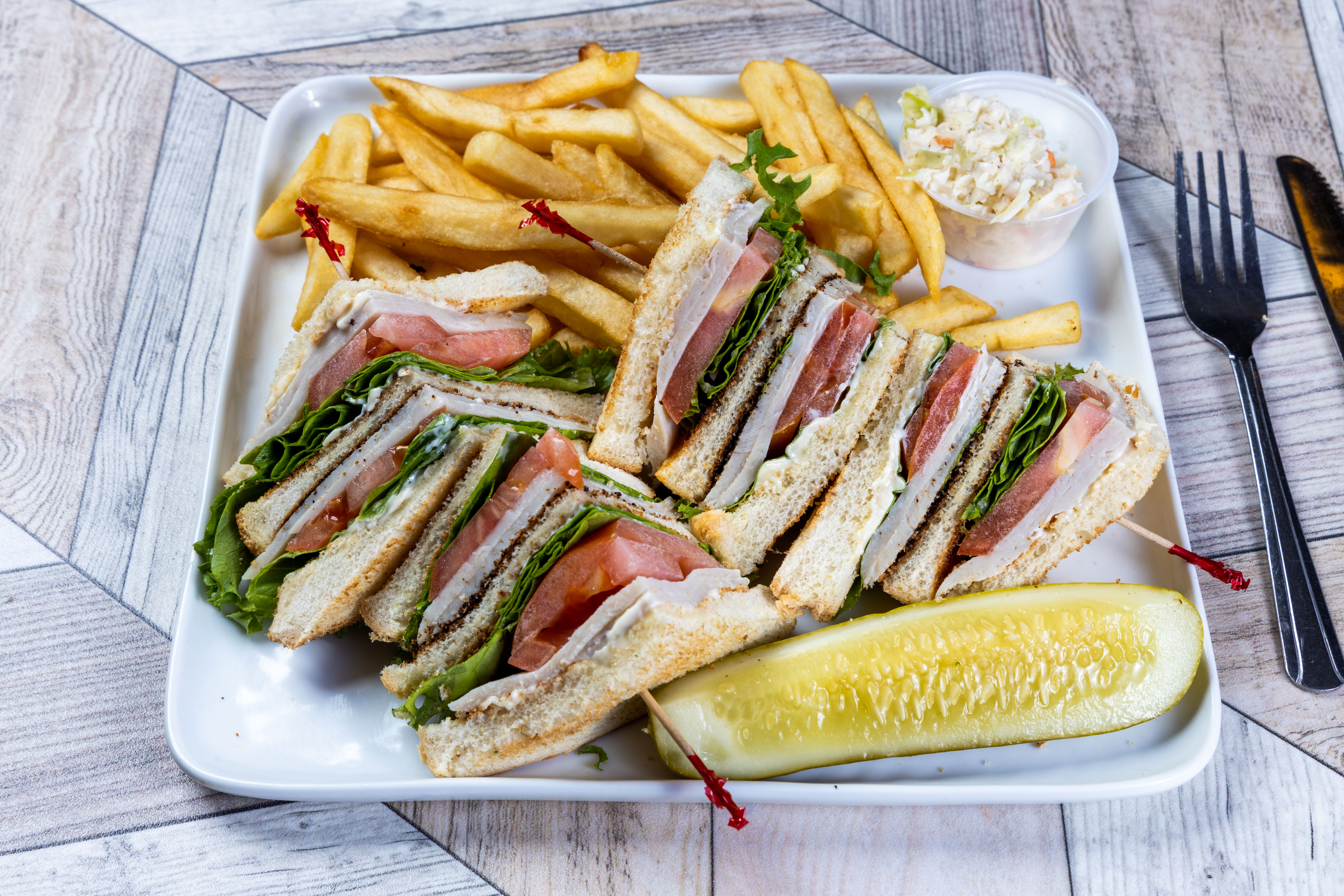 Order Turkey Club food online from Top View Restaurant store, Chicago on bringmethat.com