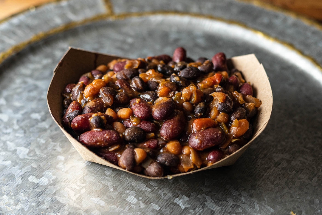 Order **Pit Smoked Beans food online from Redwood Smoke Shack store, Norfolk on bringmethat.com