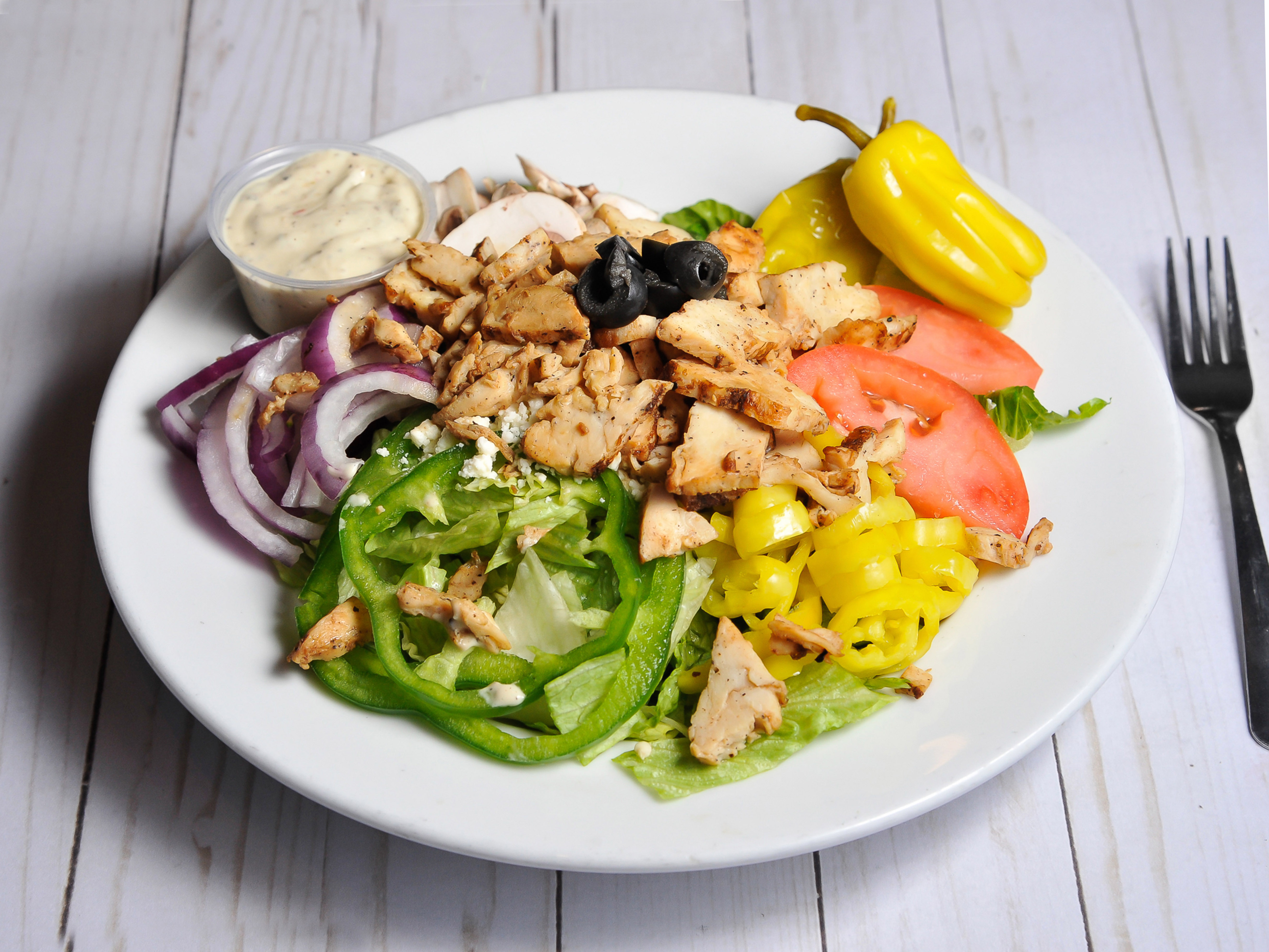 Order Greek Salad food online from Harrys Pizza And Subs store, Atlanta on bringmethat.com