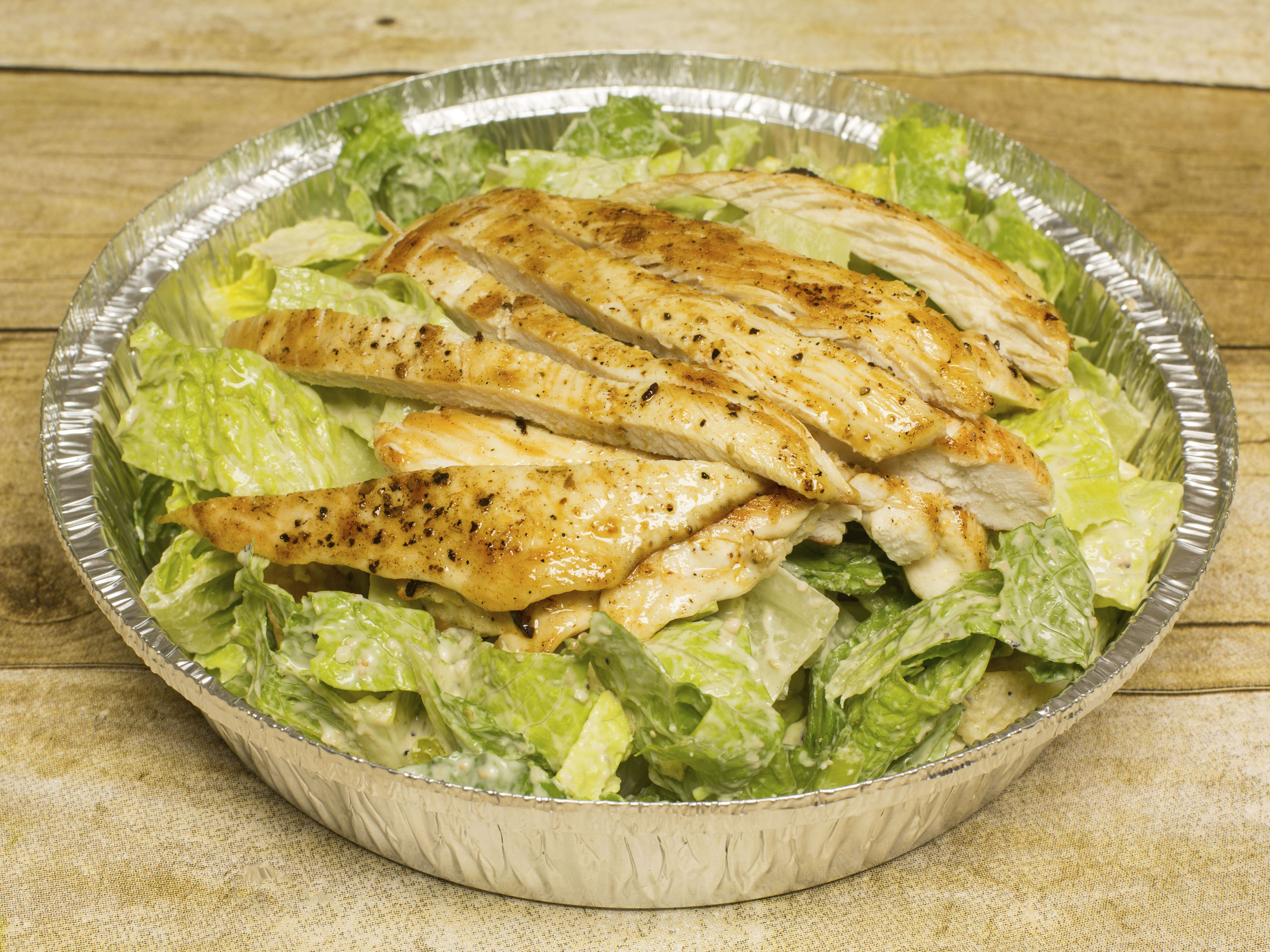 Order Caesar Salad food online from La Familia Ristorante store, Middlesex on bringmethat.com