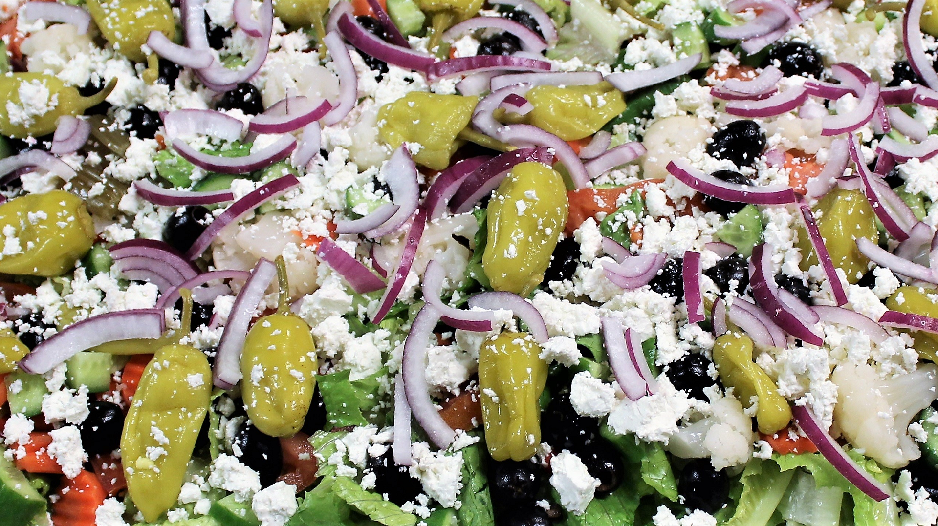 Order Tray of Greek Salad food online from Tony Pizza & Pasta store, Oak Park on bringmethat.com