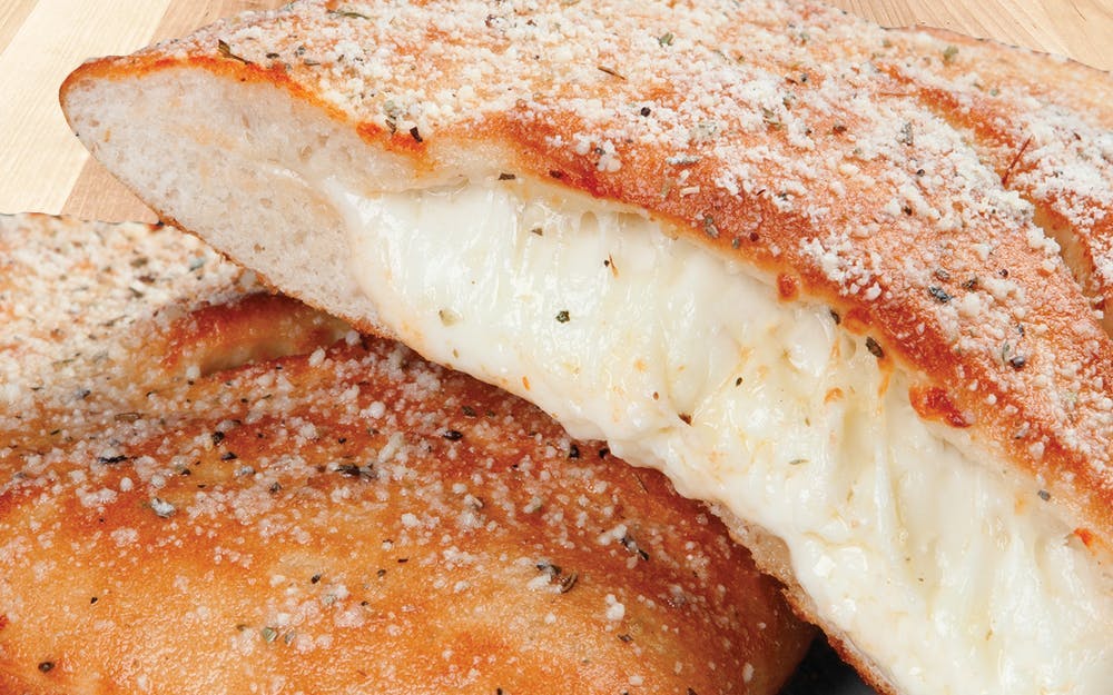 Order Calzone - Calzone food online from Godfather's Pizza Express store, Albany on bringmethat.com