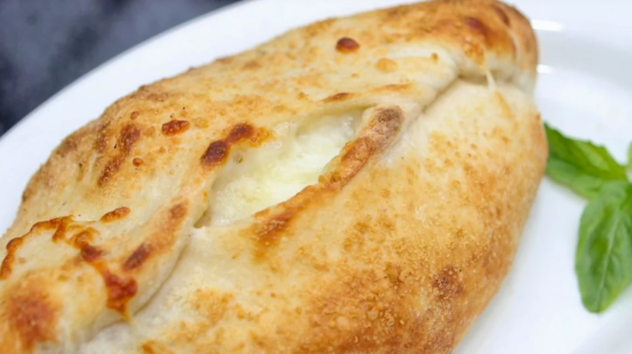 Order Vegetarian Calzone food online from Ciros Pizza Cafe store, Citrus Heights on bringmethat.com