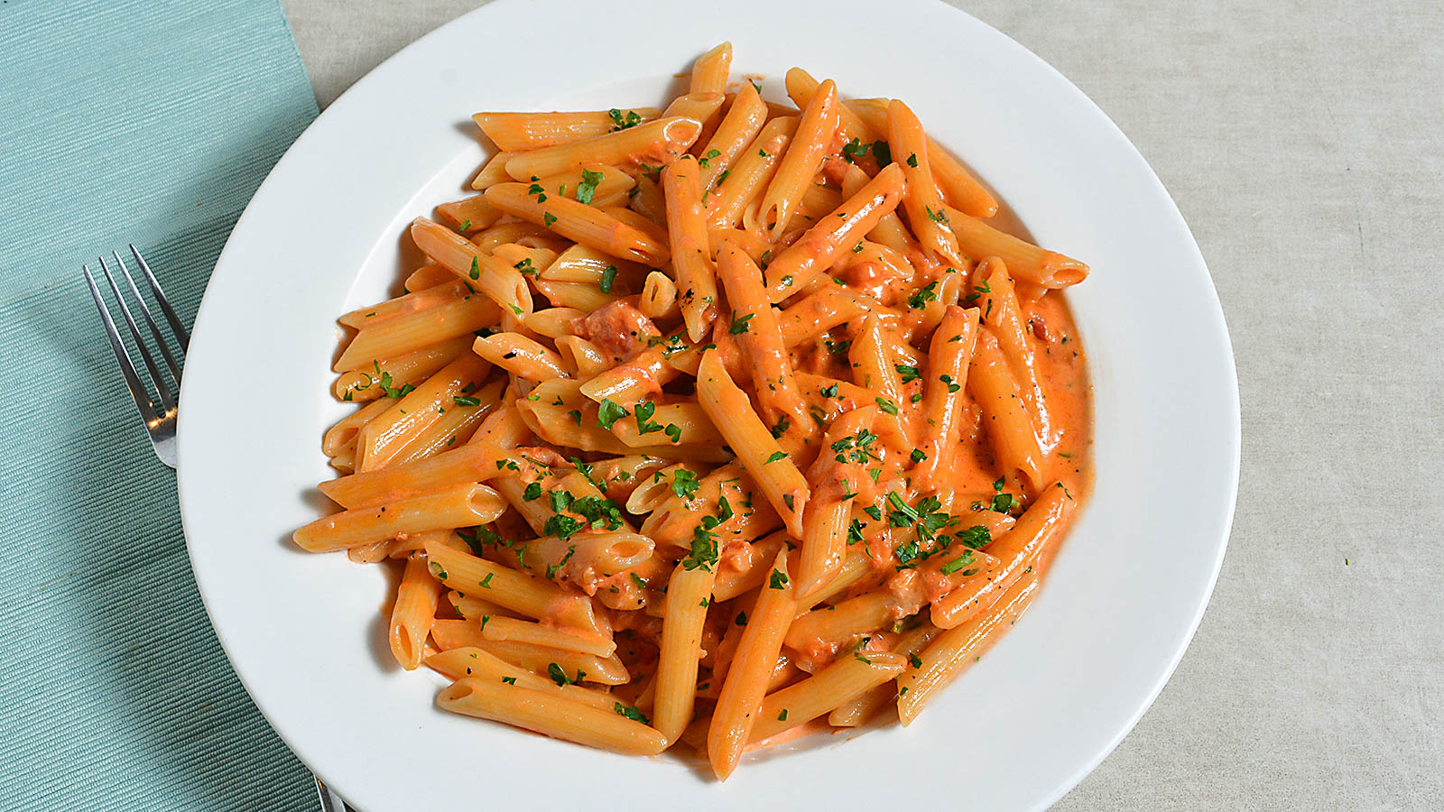 Order Penne alla Vodka  food online from Mario's Pizzeria store, Oyster Bay on bringmethat.com