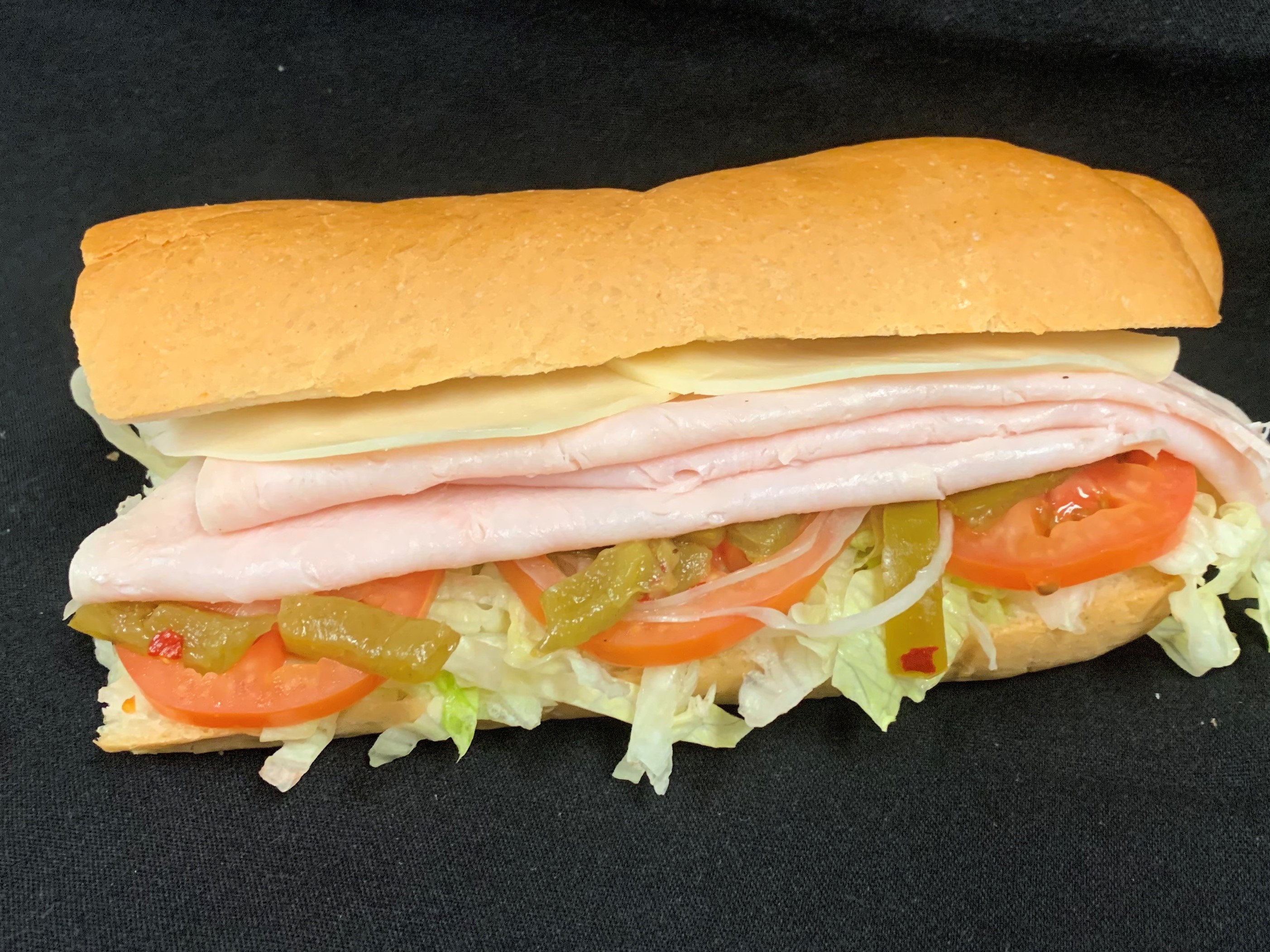 Order 12. Turkey and Cheese Sub food online from Tony Subs & Pizza store, Inglewood on bringmethat.com