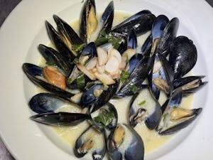 Order P.E.I. Mussels food online from Bistro 1051 store, Clark on bringmethat.com