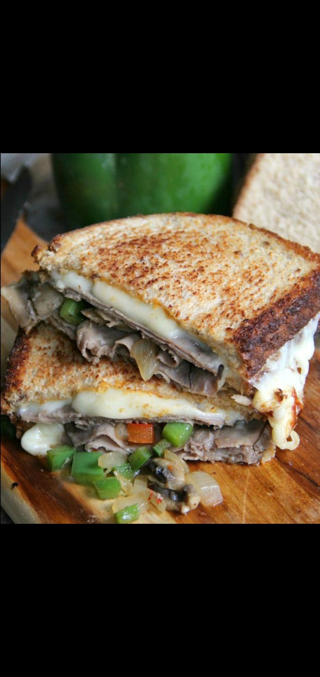 Order Roast Beef Melted Cheese Peppers & Onions Signature Sandwich  food online from American Gourmet Foods Deli store, New York on bringmethat.com
