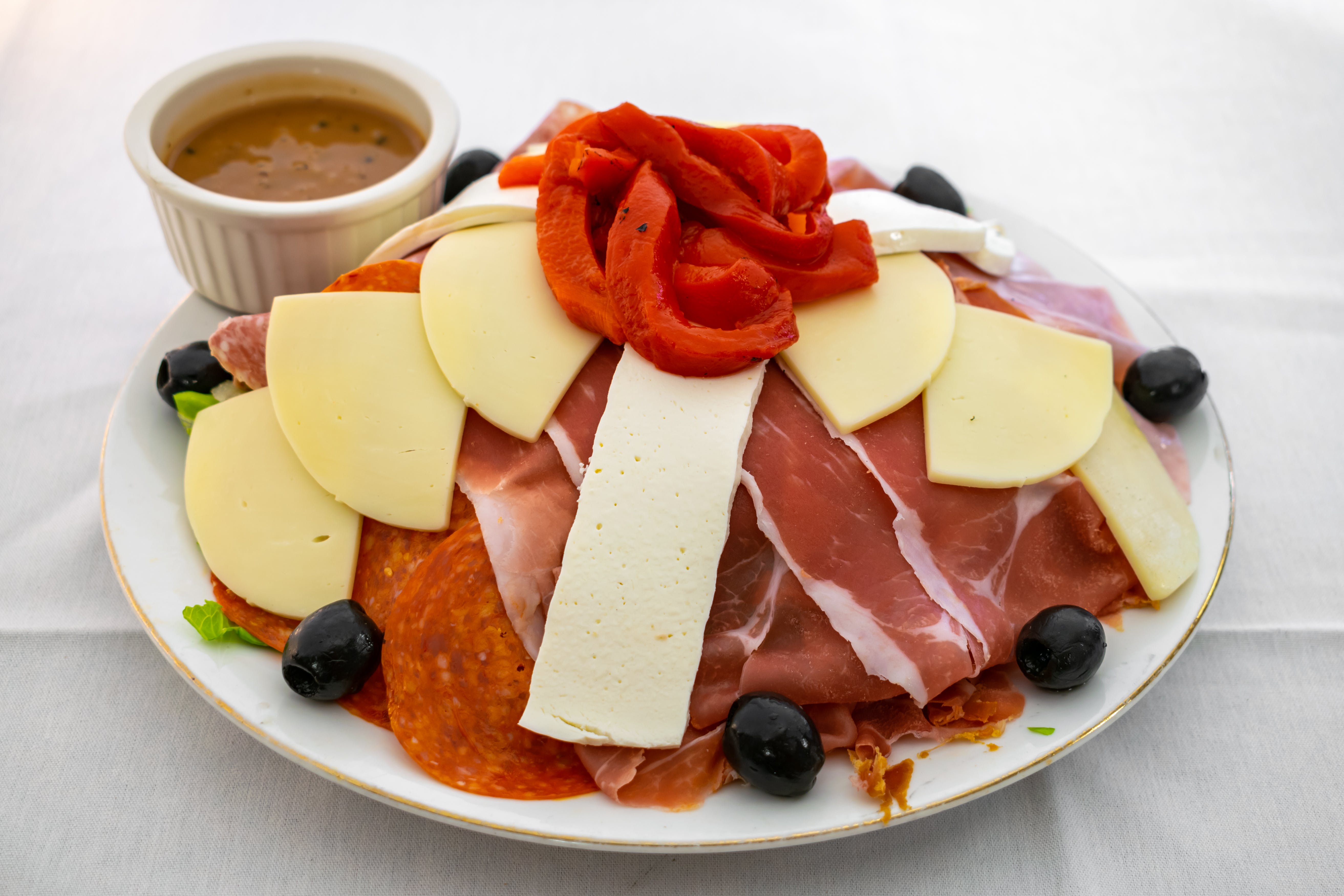 Order Antipasto Salad - Salad food online from Se7te Woodfire Pizza store, Totowa on bringmethat.com