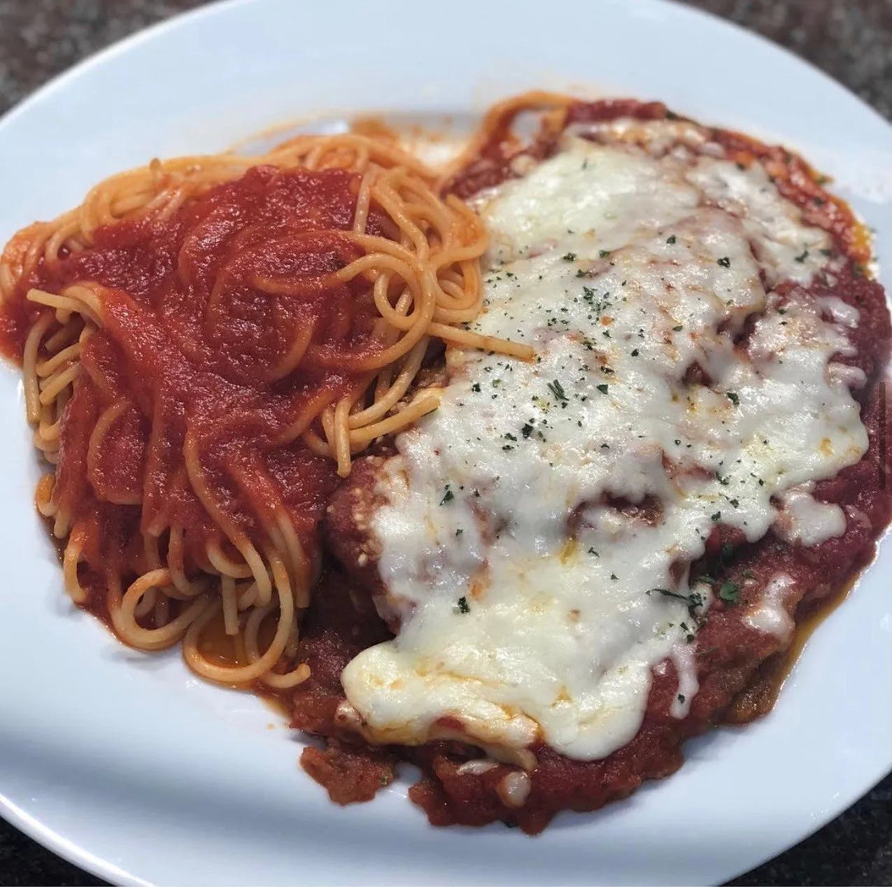 Order Chicken Parmigiana - Entree food online from Padrino's Pizza & Family store, Eagleville on bringmethat.com