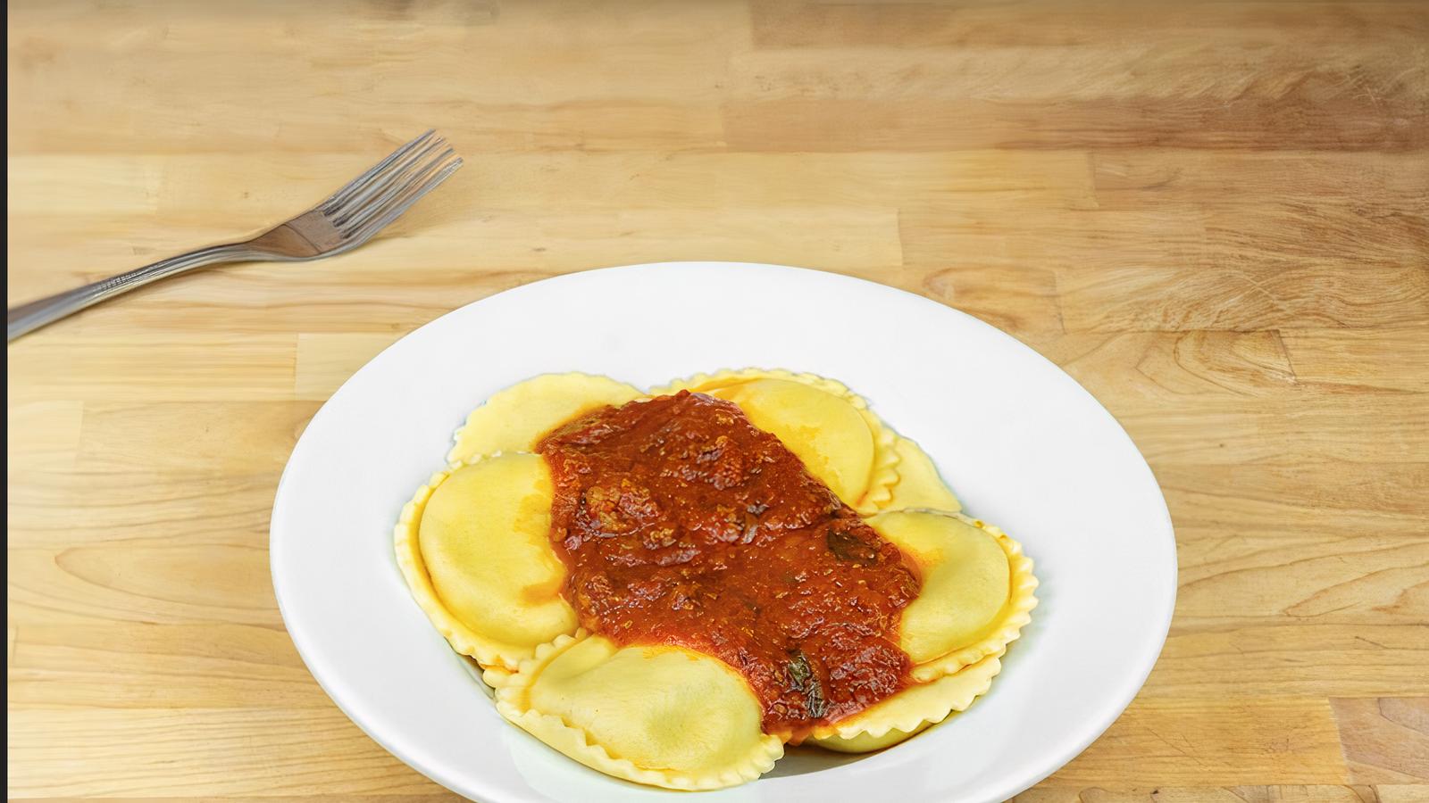 Order New York Cheese Ravioli food online from Toto's Pizzeria & Restaurant store, Belmont on bringmethat.com