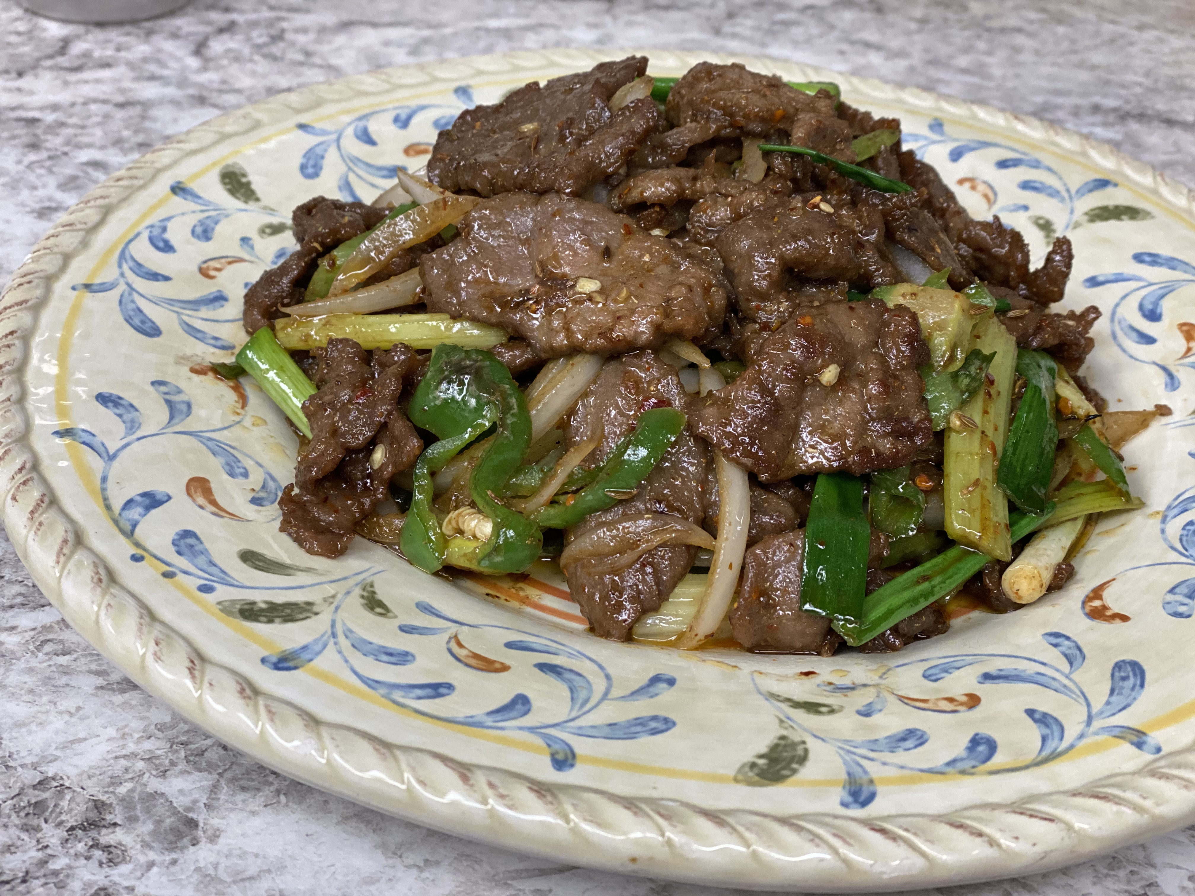 Order F07B. Cumin Beef 孜然牛肉 food online from Uncle Chen Primetime store, State College on bringmethat.com