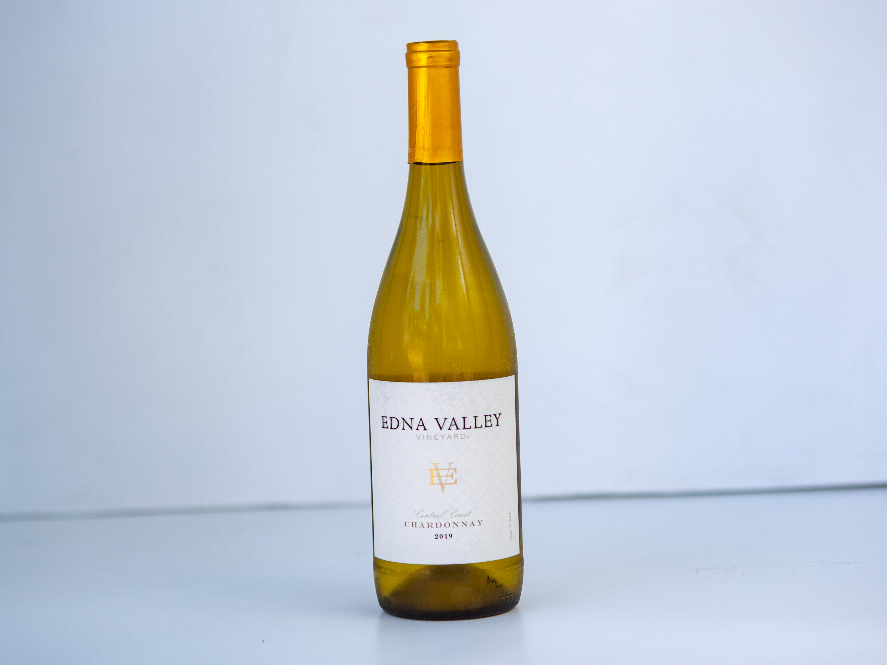 Order Edna Valley Vineyard Chardonnay, 750mL White Wine food online from Sandpiper Liquors store, Summerland on bringmethat.com