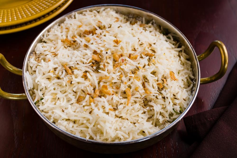 Order Jeera Ghee Rice food online from Dhaba indian cuisine store, New York on bringmethat.com