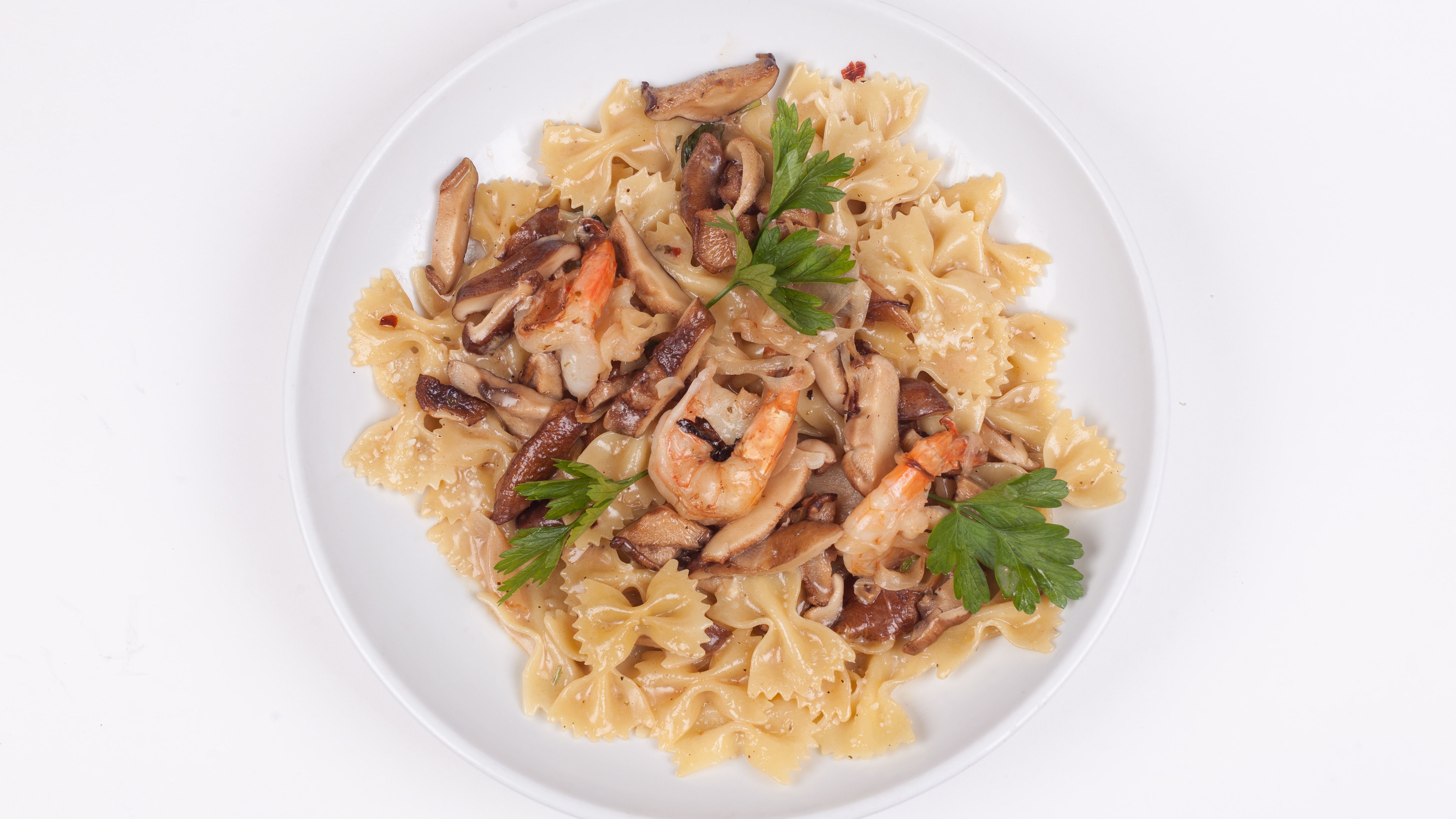Order Farfalle Shiitake food online from Umberto's Pizzeria store, New Hyde Park on bringmethat.com
